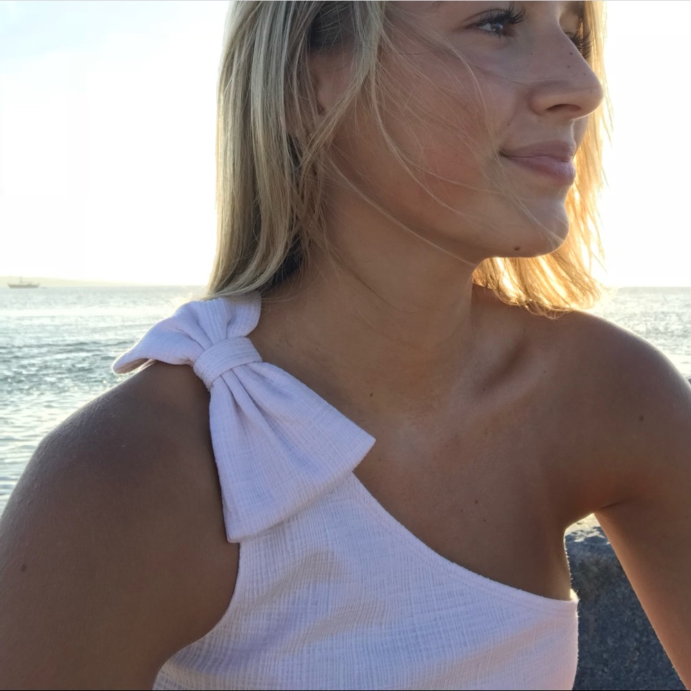 Light pink off the shoulder bow top